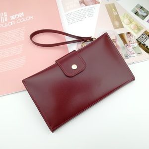 Touch screen wristlet wallet in maroon